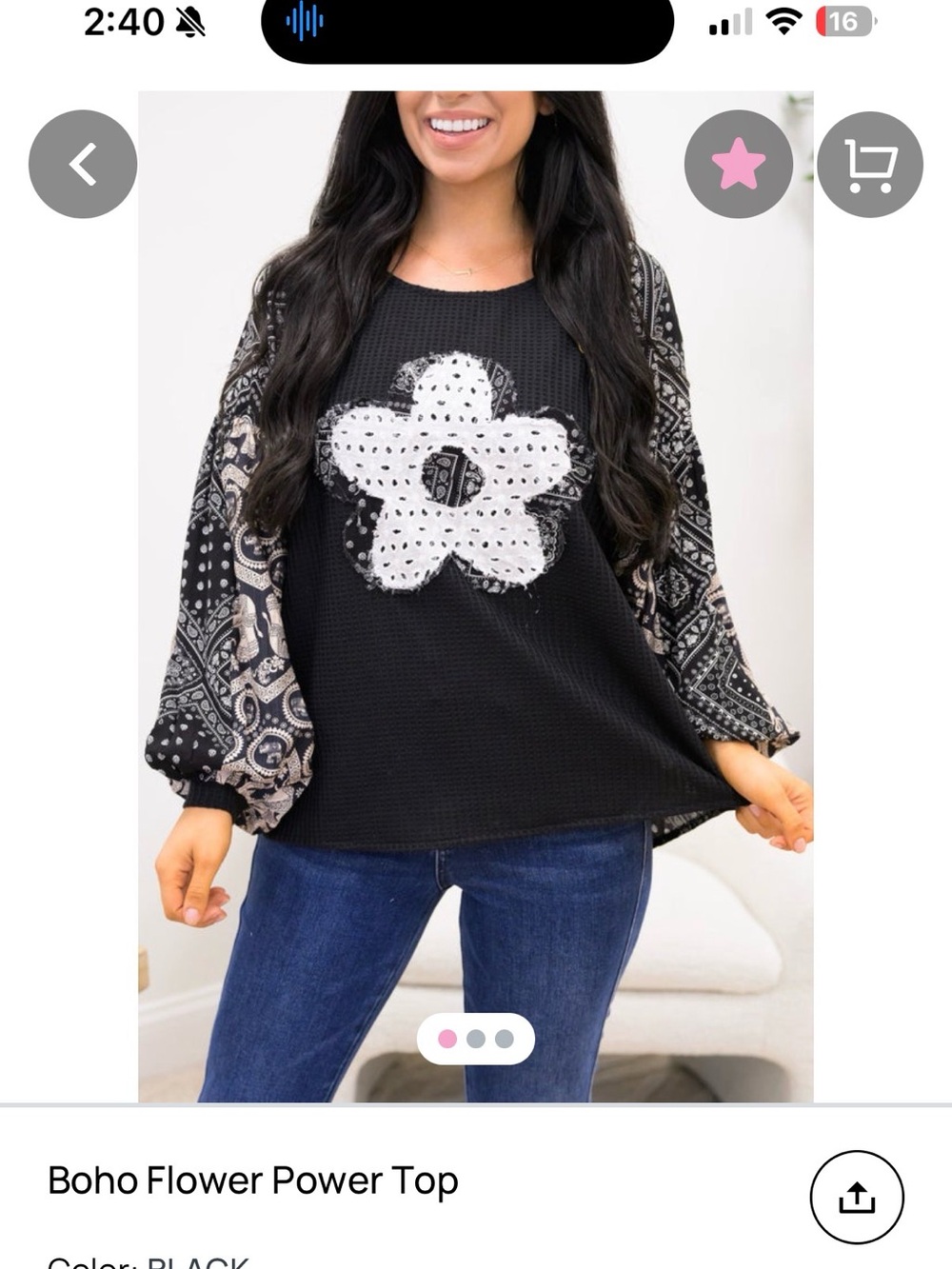 DAVI & DANI Black Long-Sleeve Top with White Floral Patch.